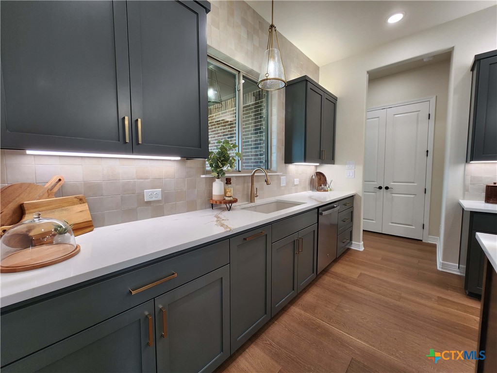 301 Rodeo Road Salado, TX 76571 - Photo 18 of 48 a bathroom with a sink double vanity granite and a mirror