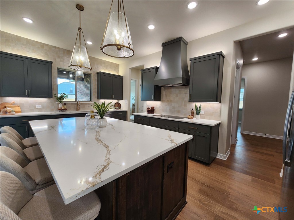 301 Rodeo Road Salado, TX 76571 - Photo 23 of 48 a large kitchen with a table and chairs