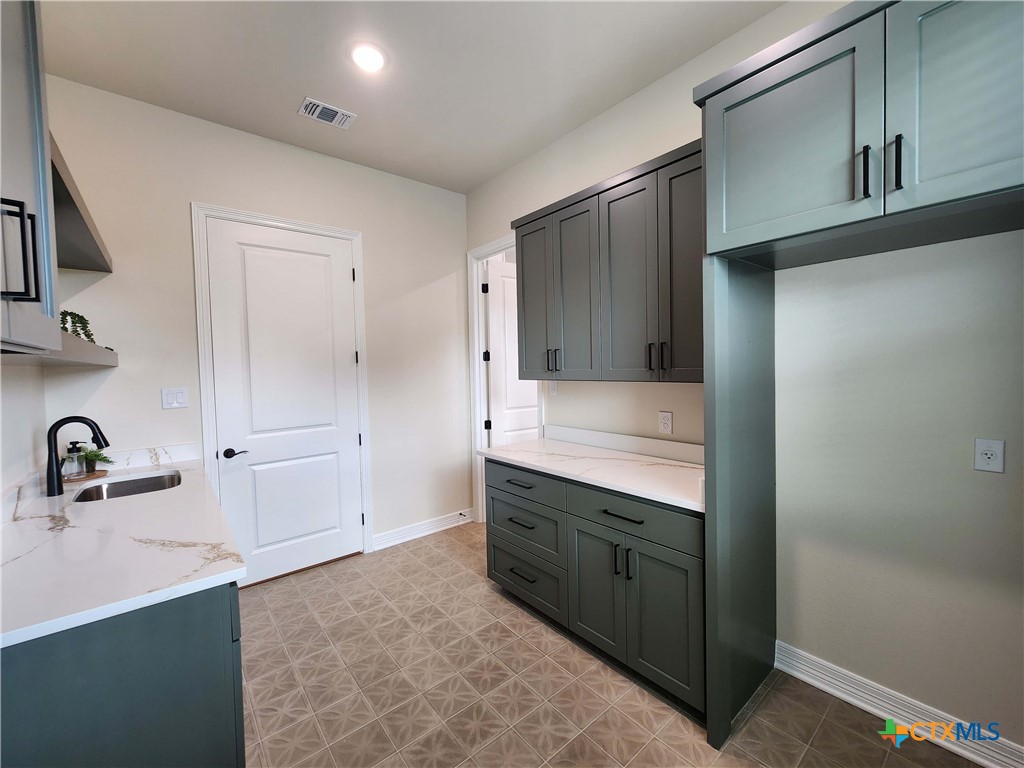 301 Rodeo Road Salado, TX 76571 - Photo 28 of 48 a bathroom with a sink and a mirror
