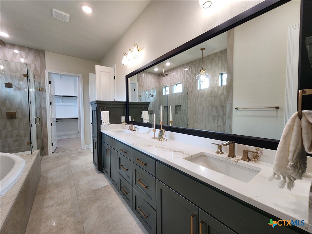 301 Rodeo Road Salado, TX 76571 - Photo 37 of 48 a bathroom with a double vanity sink mirror and double