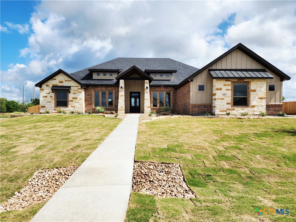 301 Rodeo Road Salado, TX 76571 - Photo 4 of 48 a front view of a house with a yard