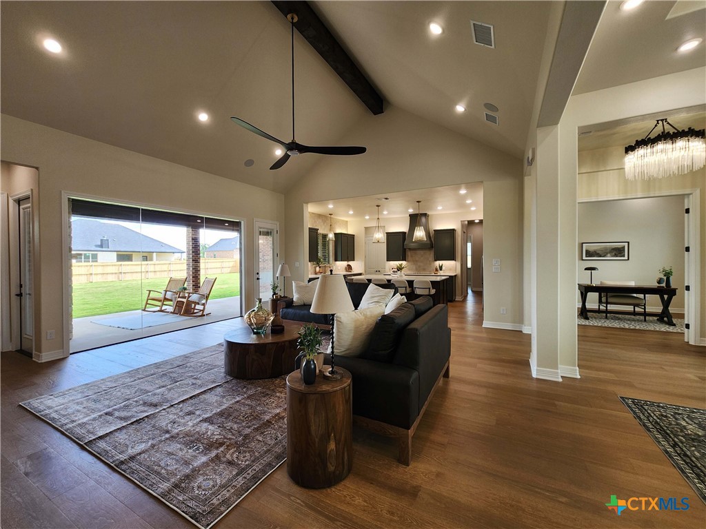 301 Rodeo Road Salado, TX 76571 - Photo 45 of 48 a living room with furniture and a wooden floor