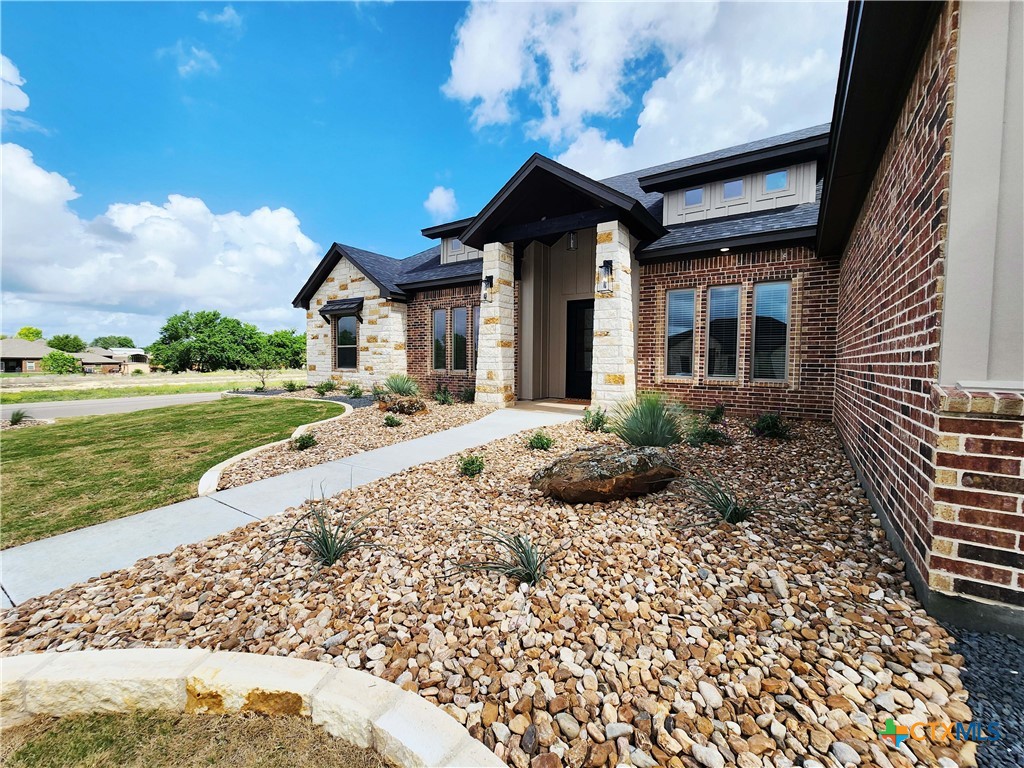 301 Rodeo Road Salado, TX 76571 - Photo 5 of 48 a front view of a house with a yard