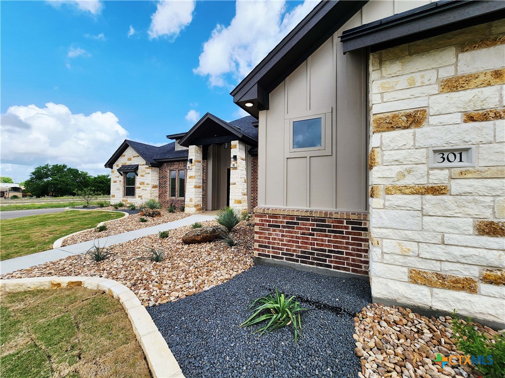 301 Rodeo Road Salado, TX 76571 - Photo 6 of 48 a front view of a house with a yard