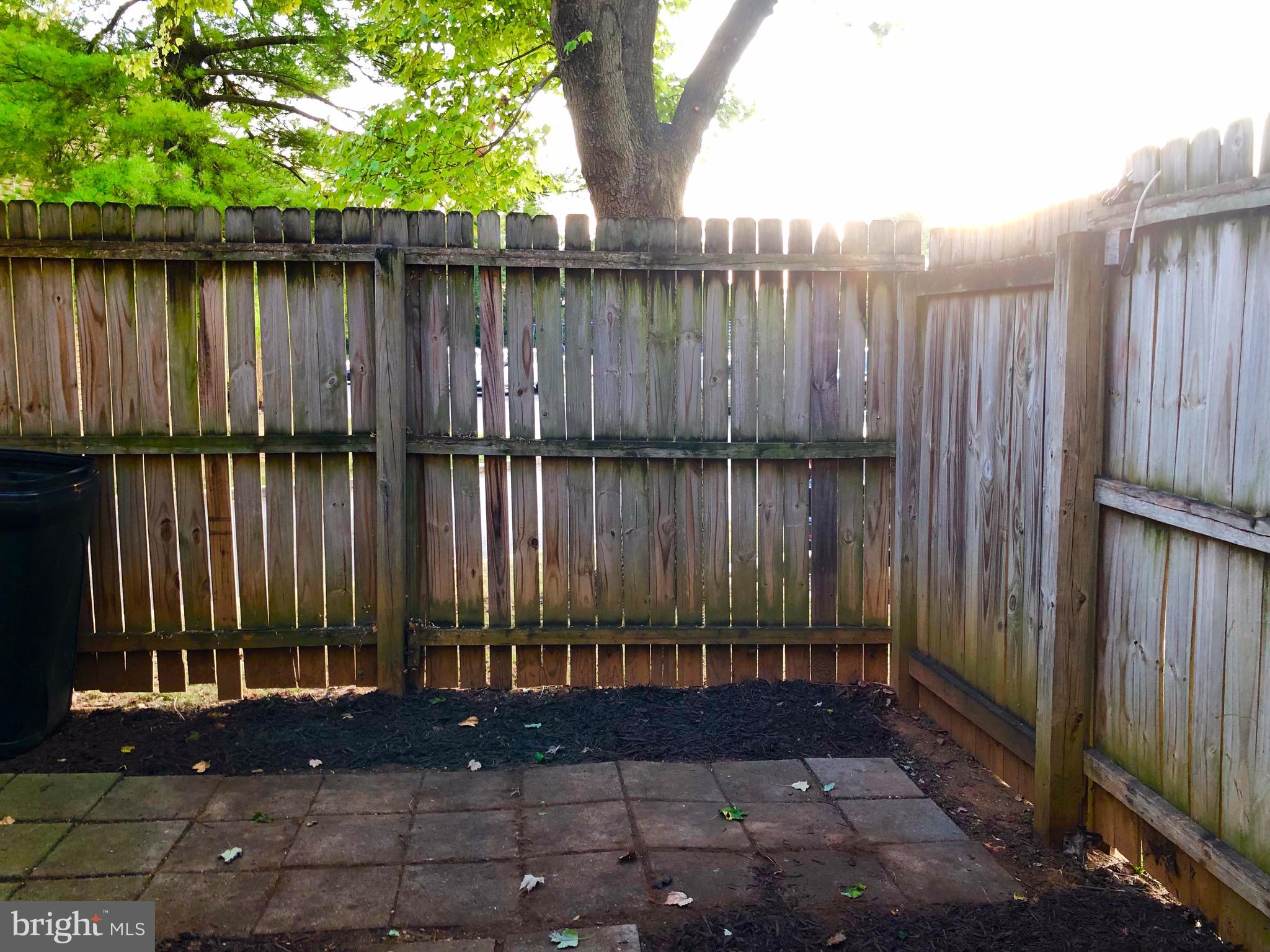 7197 A Cimarron Court Frederick, MD 21703 - Photo 19 of 23 a view of a house with a backyard