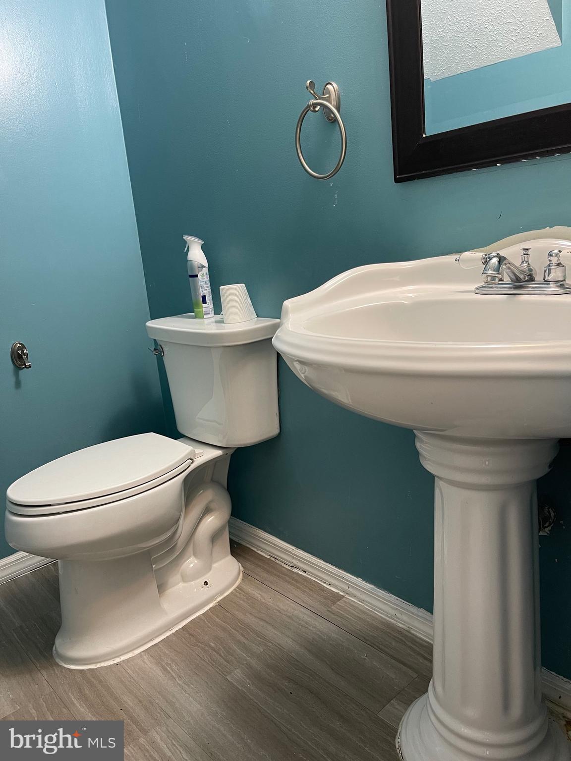 7197 A Cimarron Court Frederick, MD 21703 - Photo 8 of 23 a bathroom with a sink toilet and a mirror