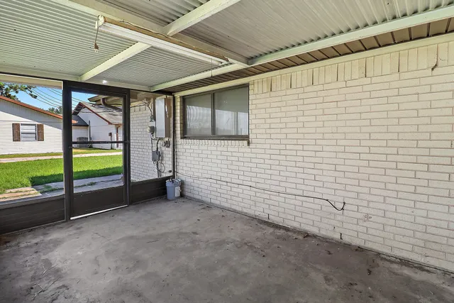 a view of an empty room with a balcony