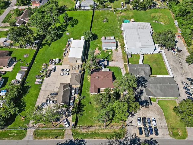 an aerial view of a house with a garden
