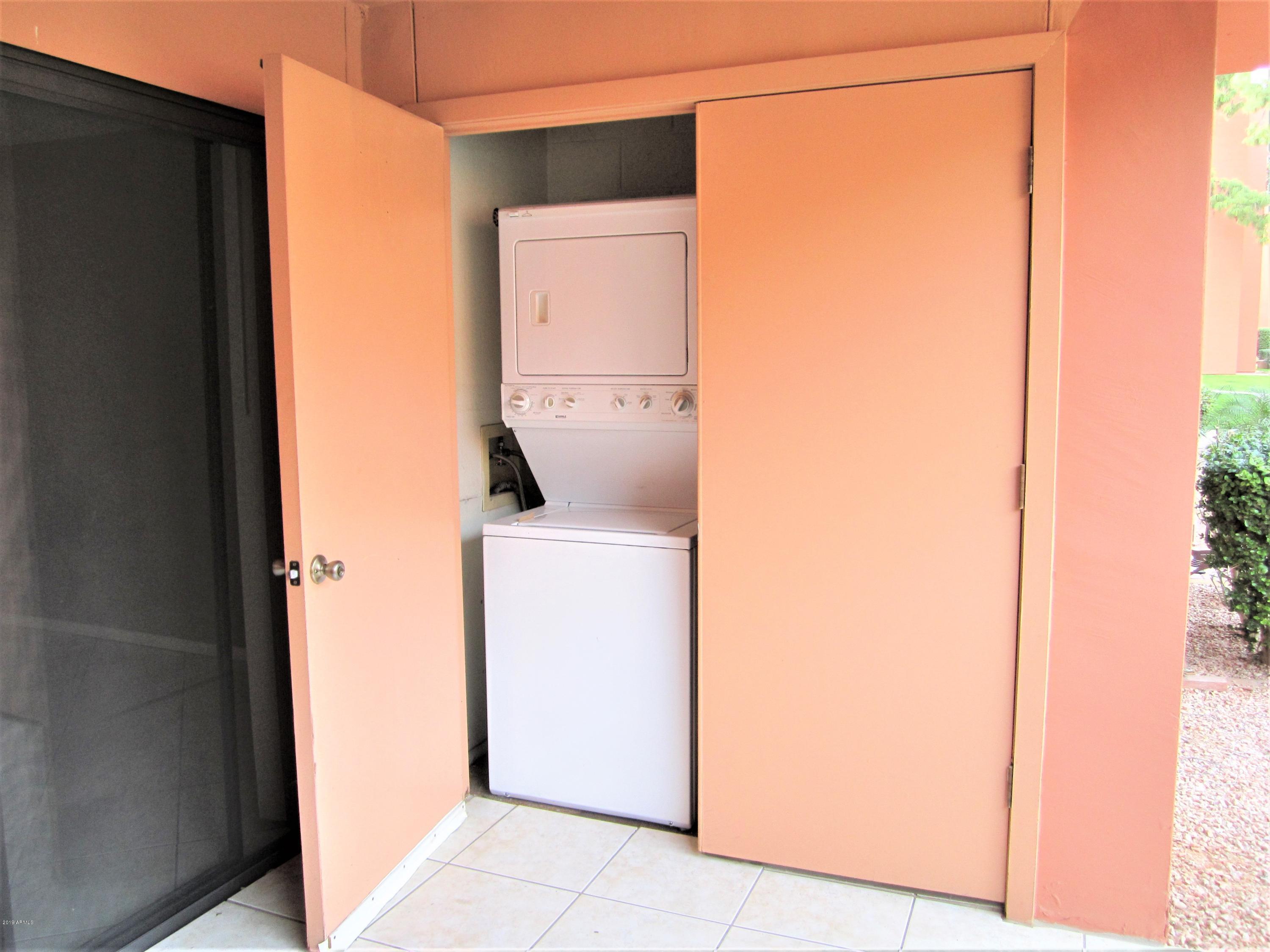 4303 East Cactus Road, Unit 116 Phoenix, AZ 85032 - Photo 23 of 35 a utility room with dryer and washer