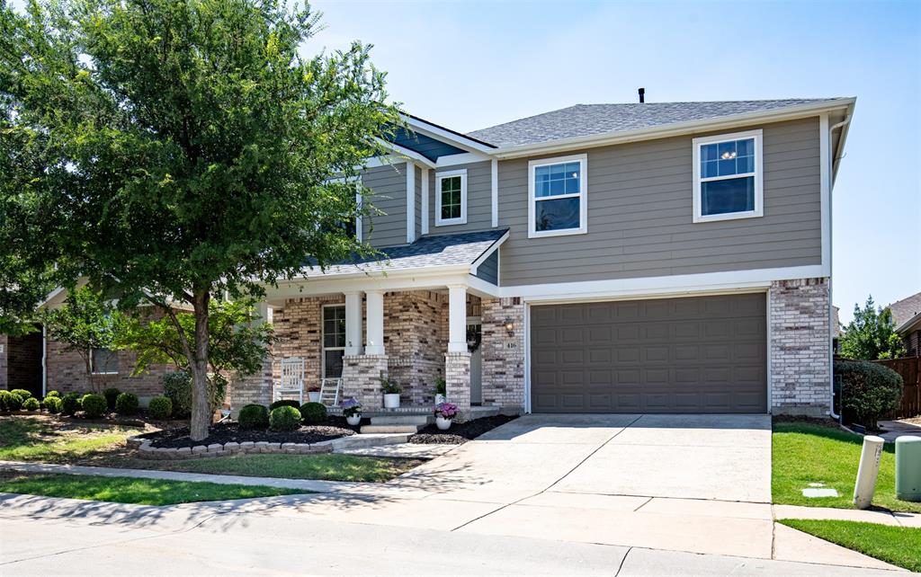 416 Allbright Road Celina, TX 75009 - Photo 2 of 40 a front view of a house with garden