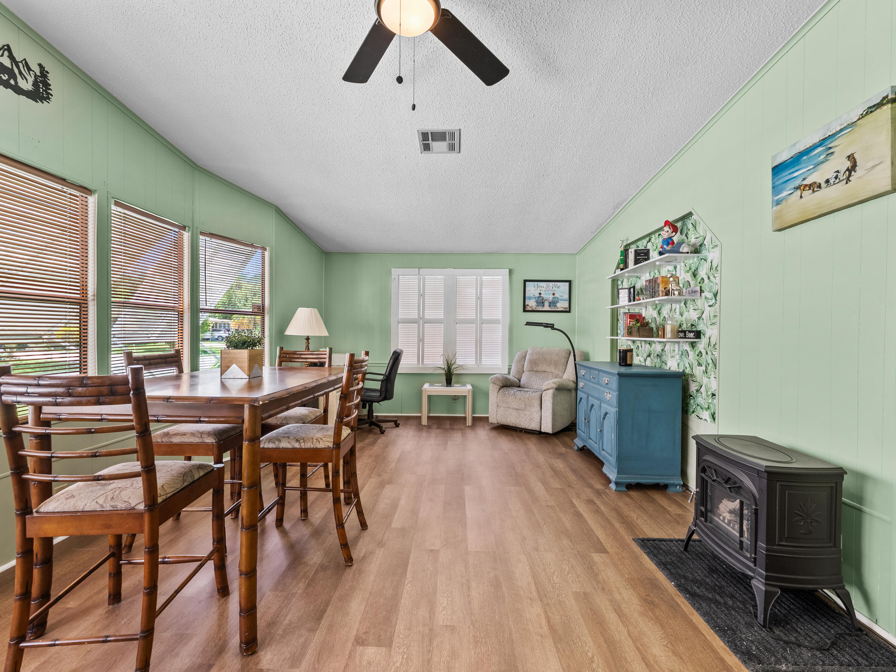 2855 Southwest Monarch Trail Stuart, FL 34997 - Photo 13 of 37 a living room with furniture and a large window