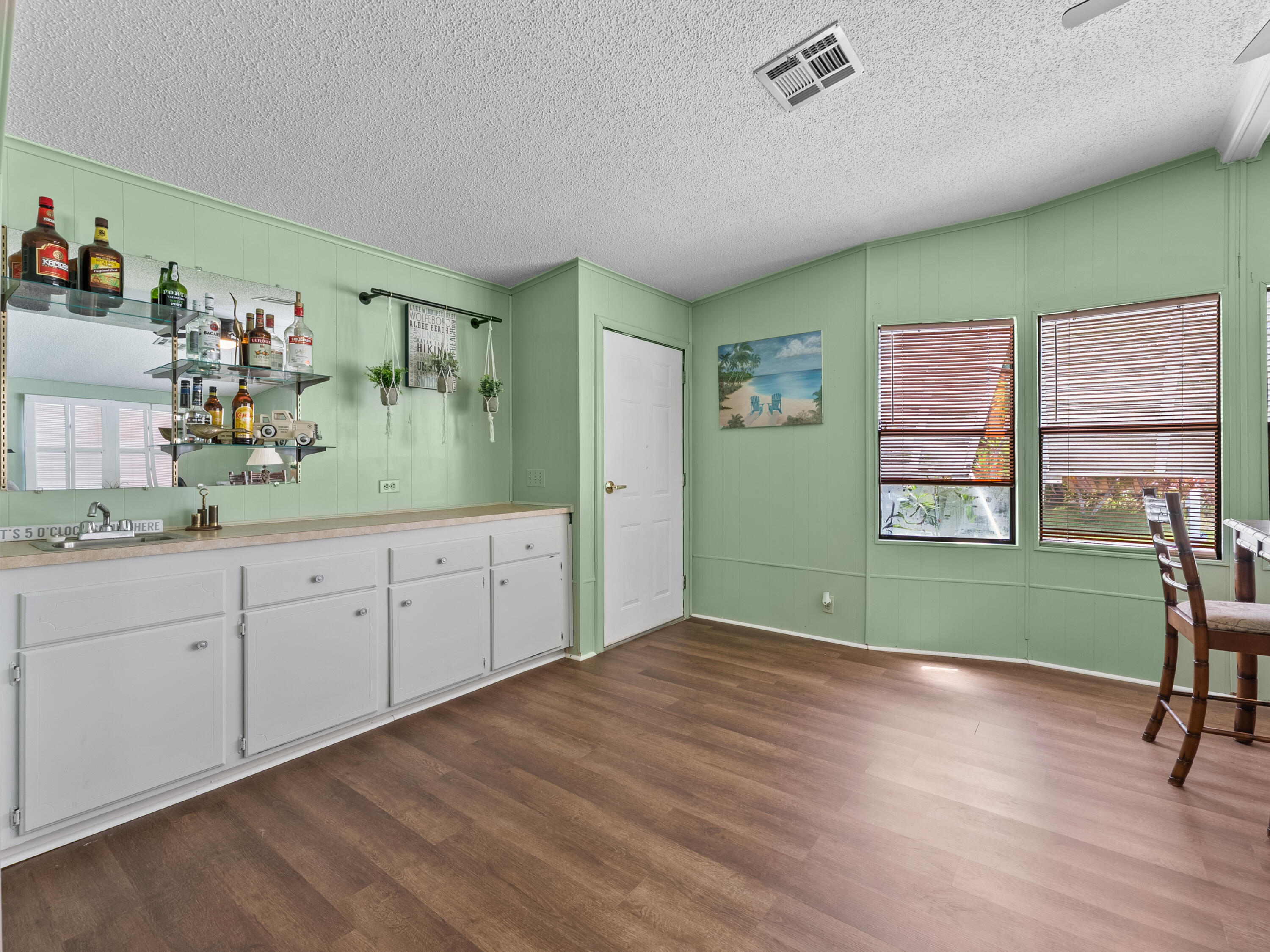 2855 Southwest Monarch Trail Stuart, FL 34997 - Photo 17 of 37 a room with window and bathroom