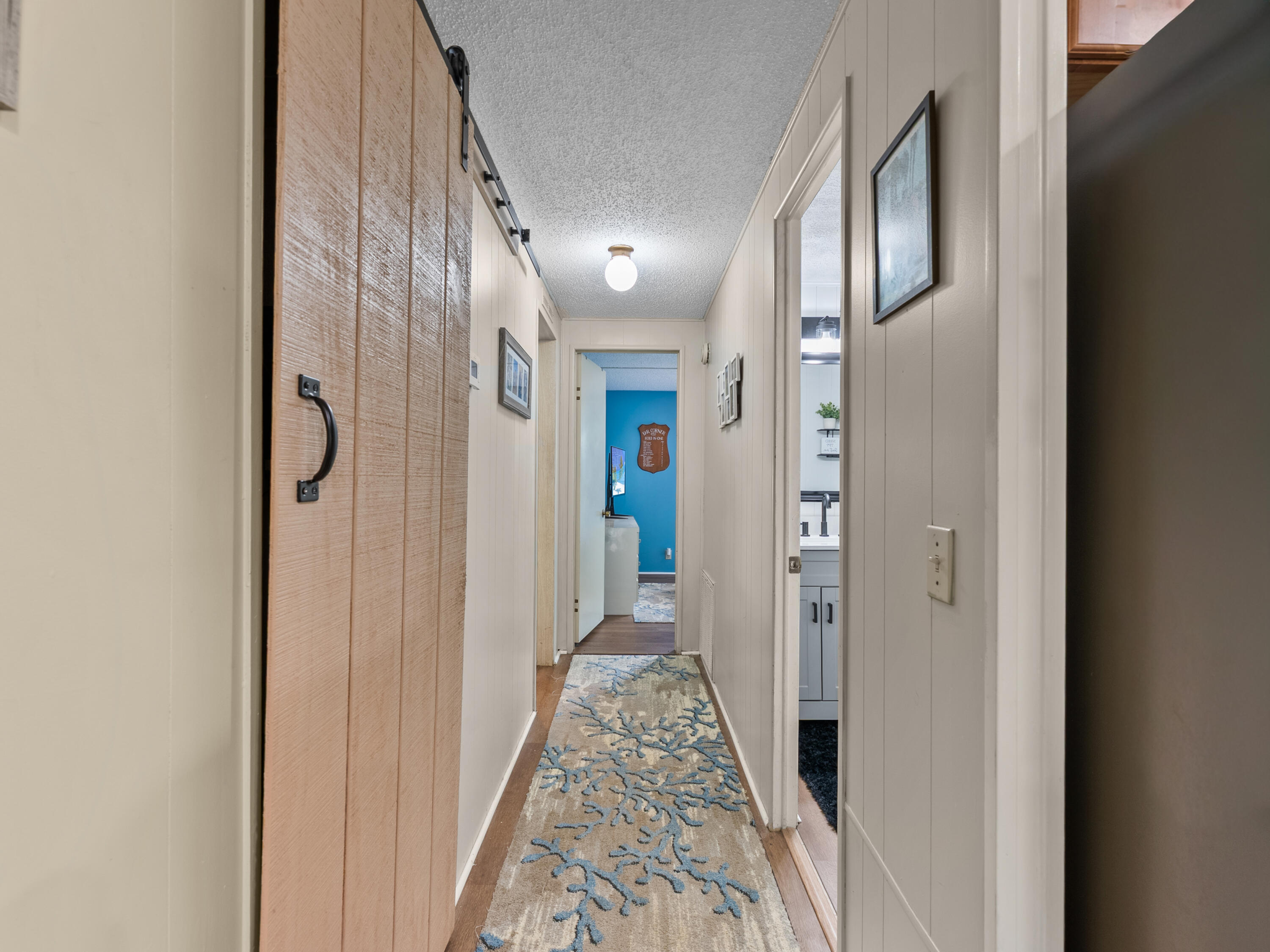 2855 Southwest Monarch Trail Stuart, FL 34997 - Photo 18 of 37 a view of a hallway view with staircase