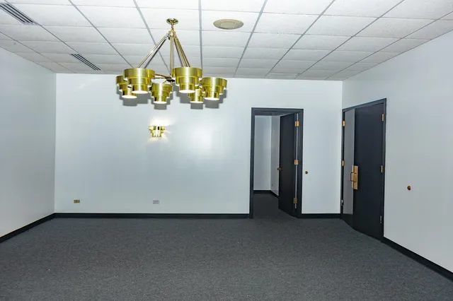 a bathroom with a sink mirror and vanity