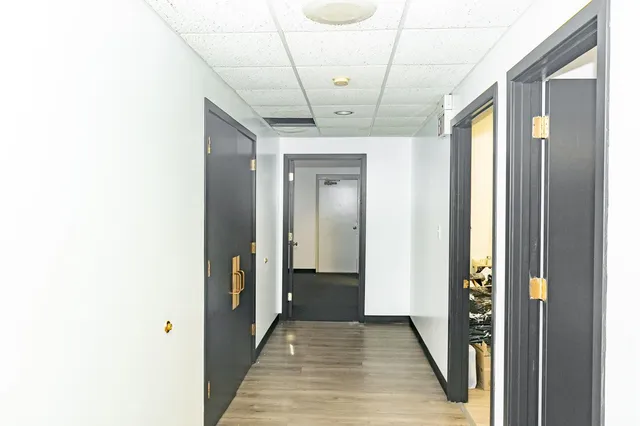 a bed room with a bed and table