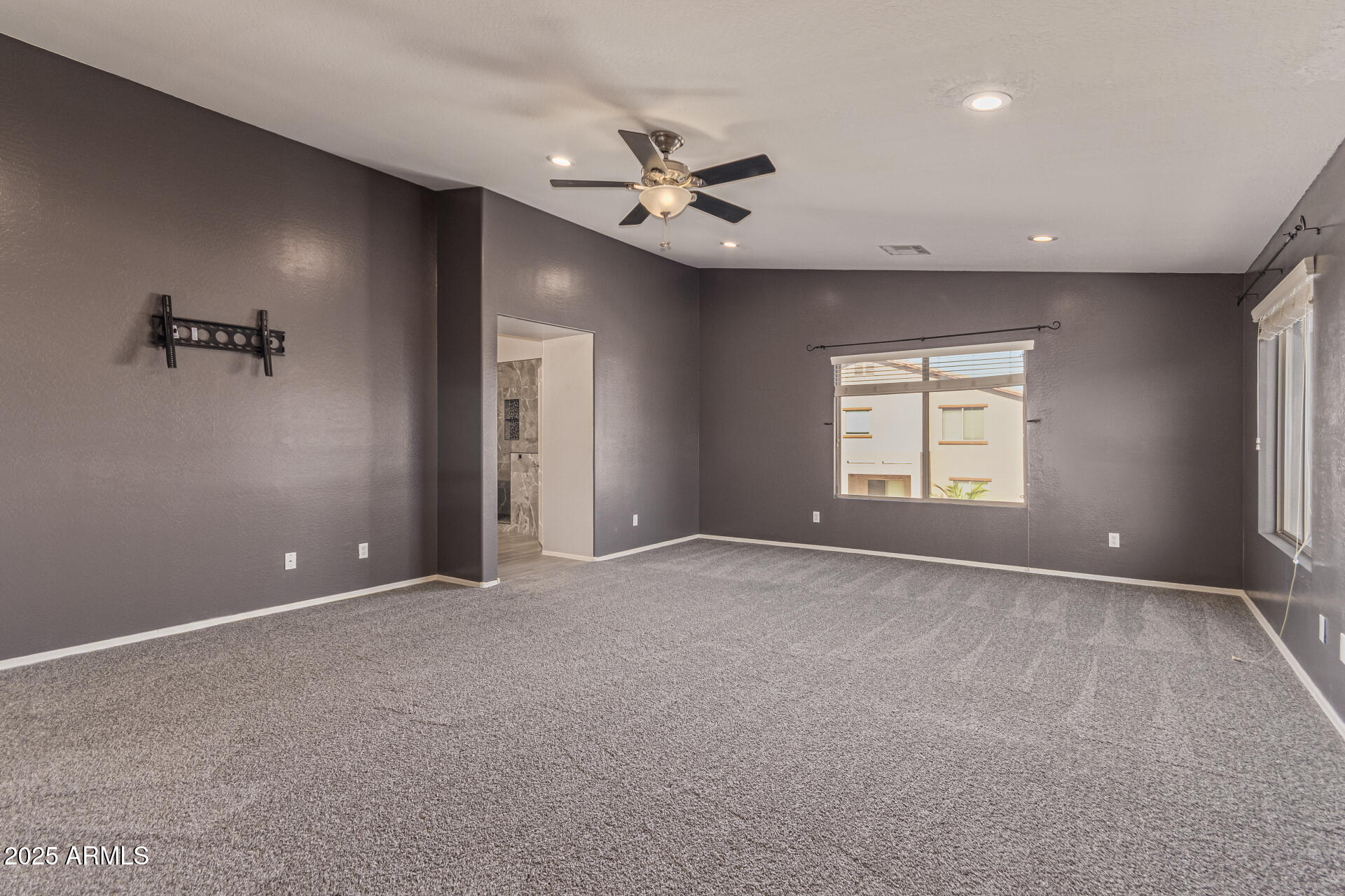 17868 West Charter Oak Road Surprise, AZ 85388 - Photo 29 of 67 a view of an empty room with a window