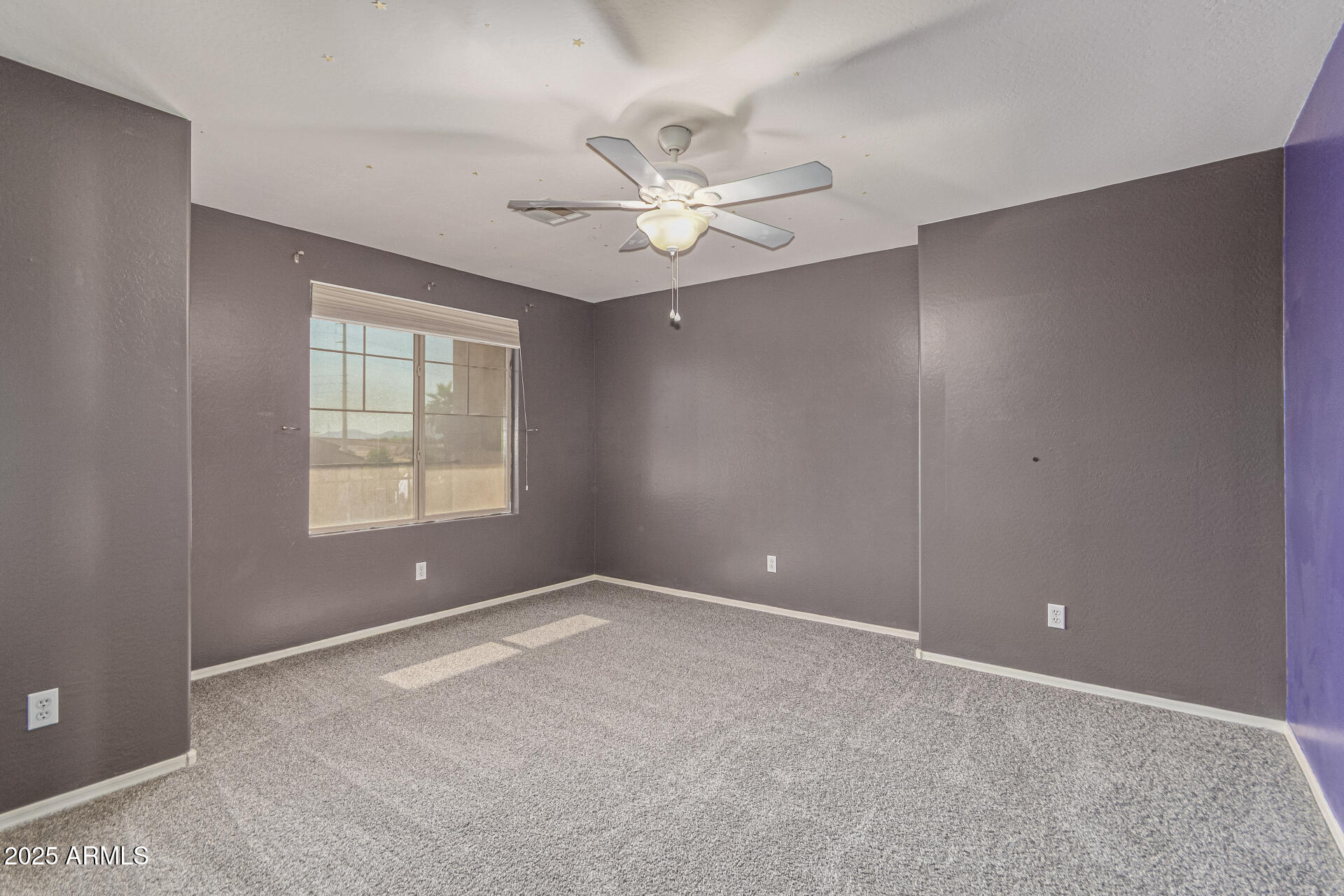 17868 West Charter Oak Road Surprise, AZ 85388 - Photo 34 of 67 a view of an empty room with a window