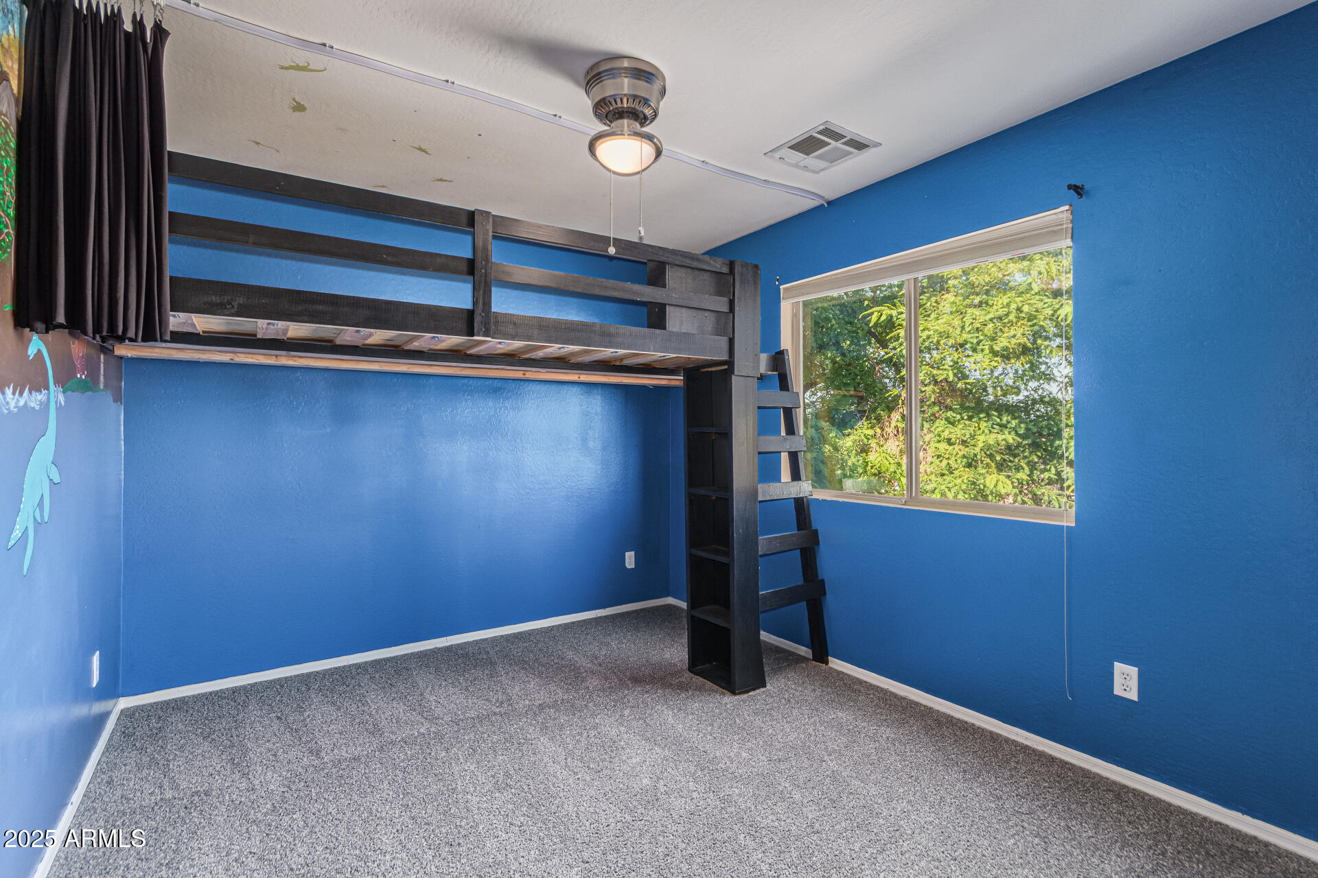 17868 West Charter Oak Road Surprise, AZ 85388 - Photo 37 of 67 a view of an empty room with a window
