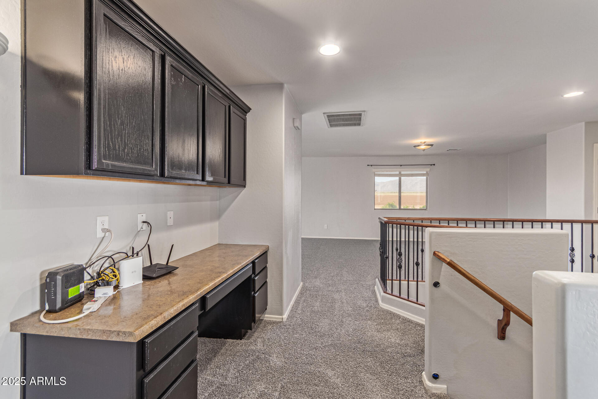 17868 West Charter Oak Road Surprise, AZ 85388 - Photo 44 of 67 a kitchen with granite countertop a sink a stove and refrigerator