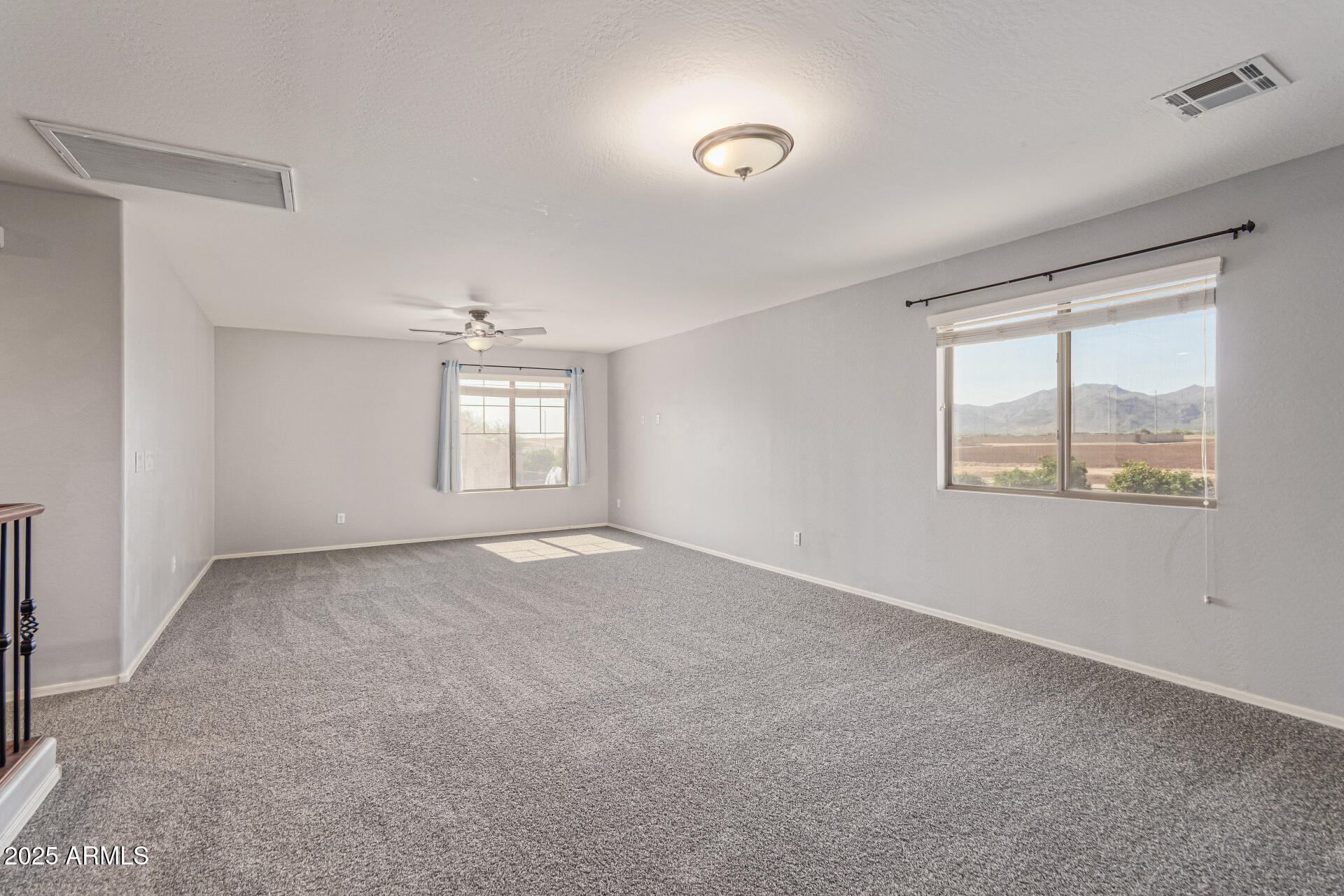 17868 West Charter Oak Road Surprise, AZ 85388 - Photo 46 of 67 a view of an empty room with a window