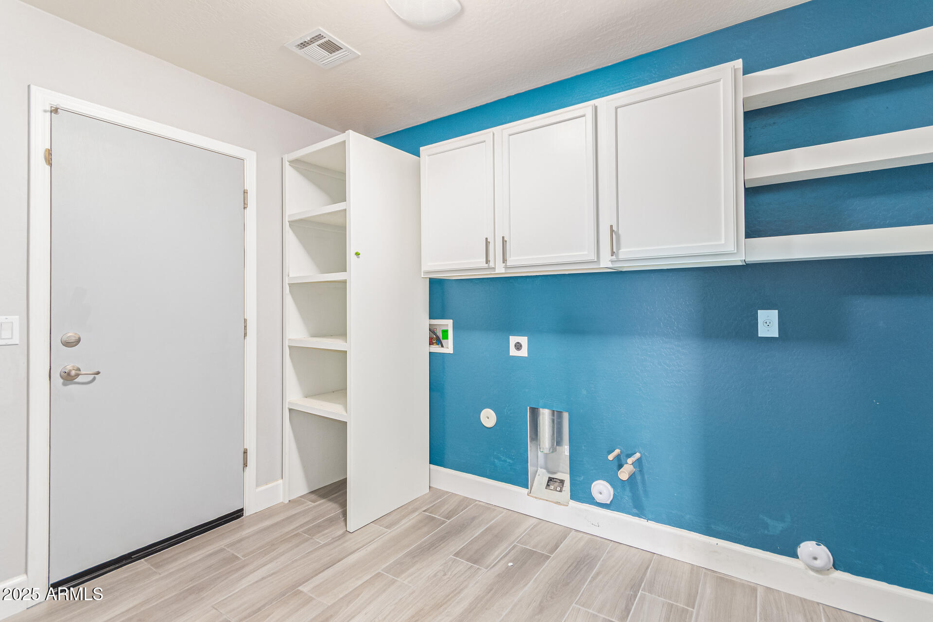 17868 West Charter Oak Road Surprise, AZ 85388 - Photo 54 of 67 a view of an empty room with closet and a window