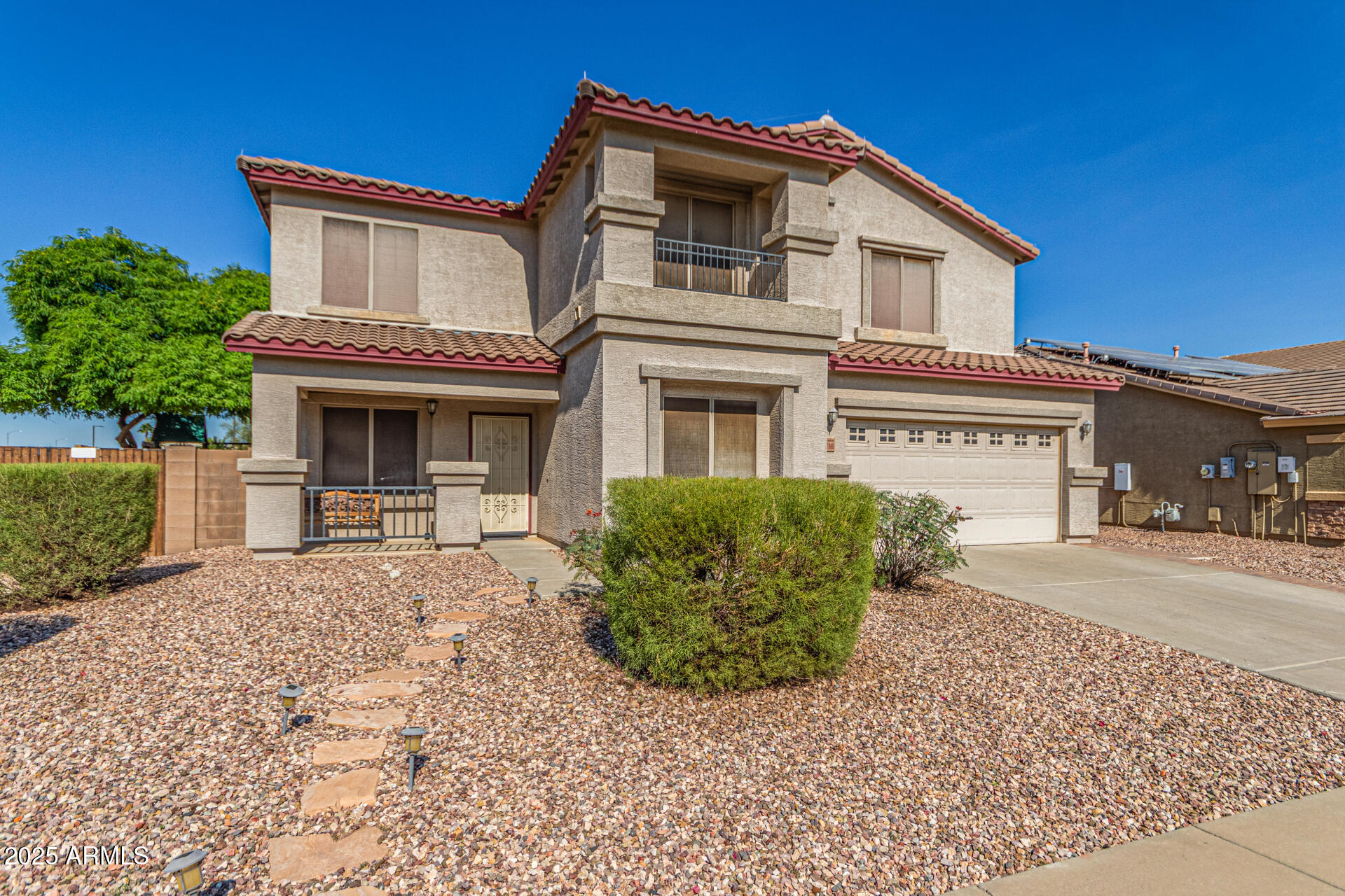 17868 West Charter Oak Road Surprise, AZ 85388 - Photo 4 of 67 front view of a house with a stove
