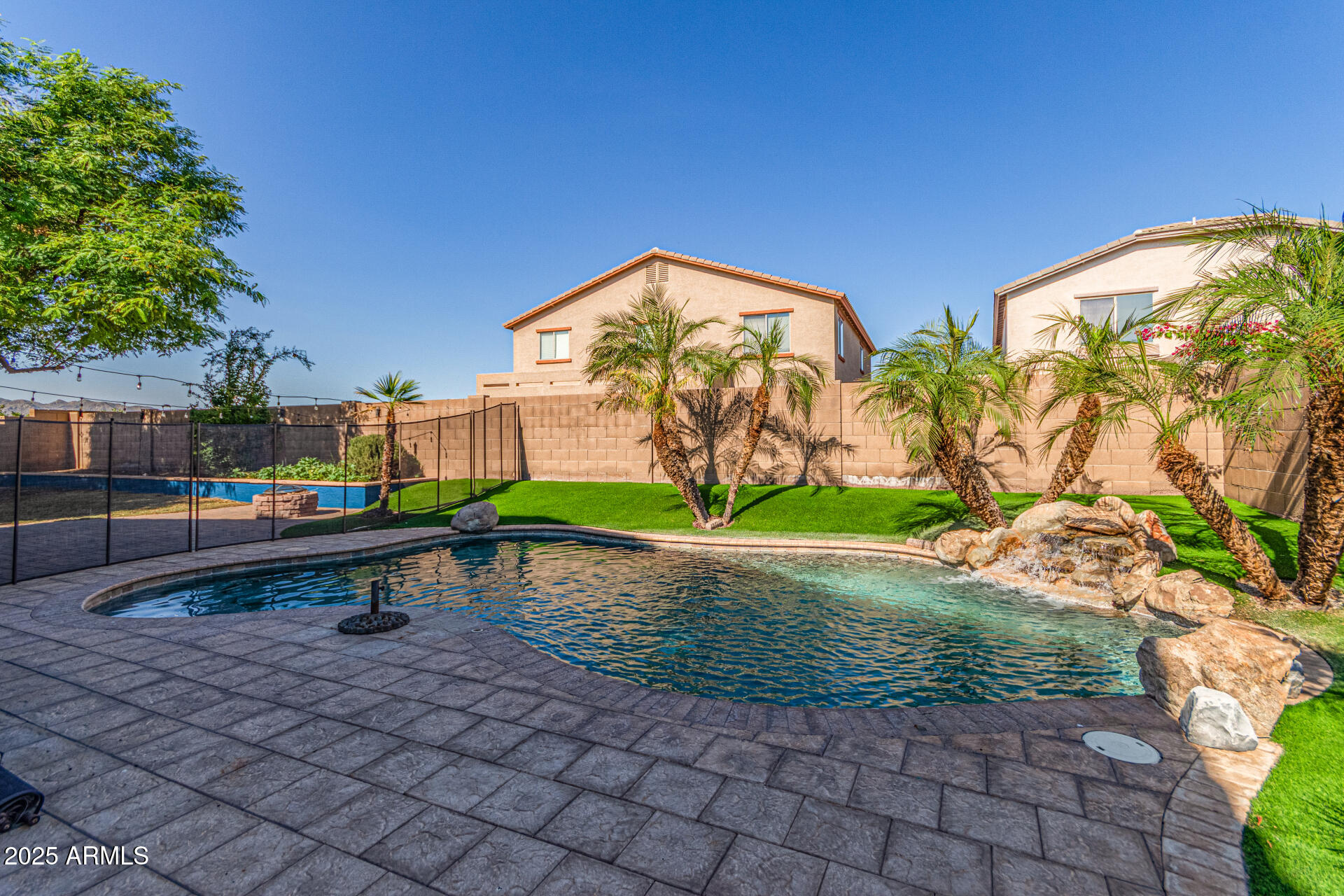 17868 West Charter Oak Road Surprise, AZ 85388 - Photo 60 of 67 a view of swimming pool with a yard
