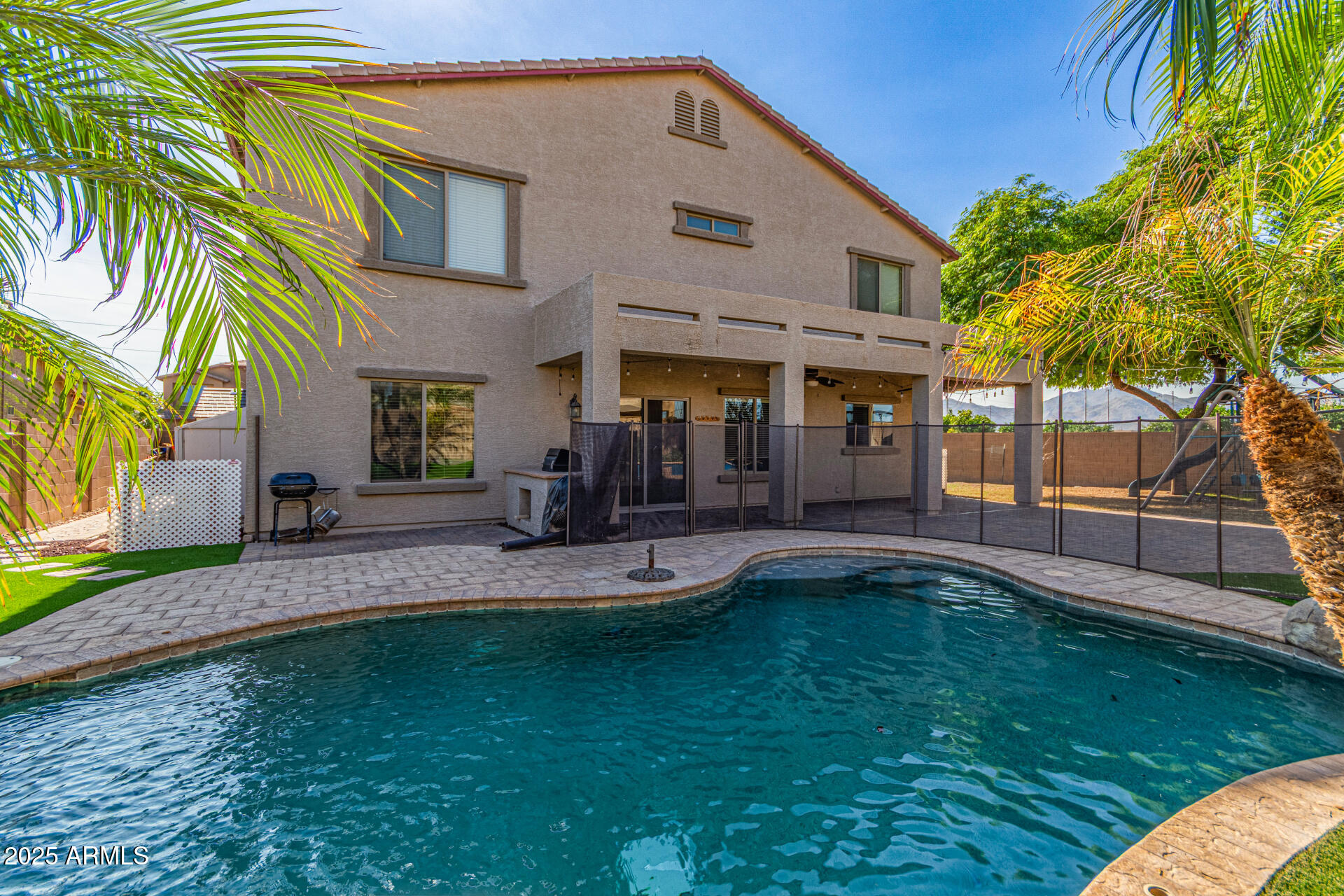 17868 West Charter Oak Road Surprise, AZ 85388 - Photo 61 of 67 a view of a house with a yard patio and swimming pool