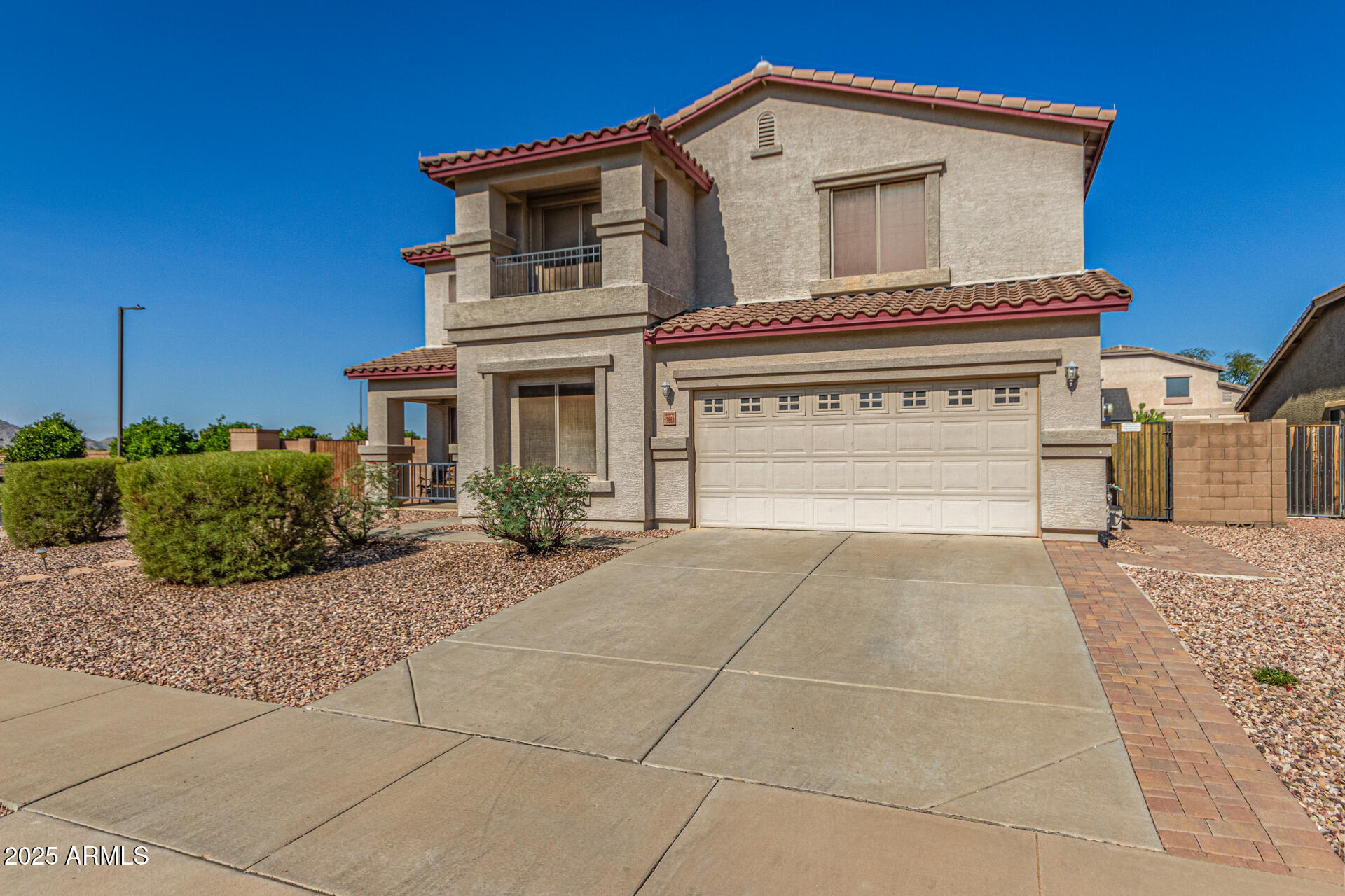 17868 West Charter Oak Road Surprise, AZ 85388 - Photo 6 of 67 a view of a house with a yard