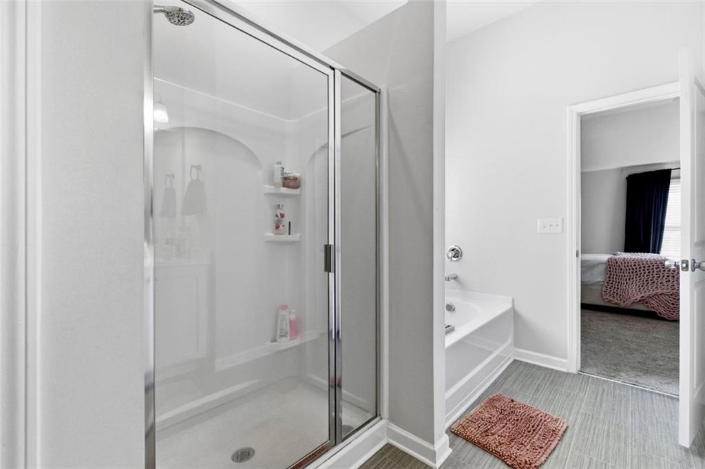 4006 Riverchess Drive Southwest Atlanta, GA 30331 - Photo 21 of 28 a en suite bathroom with a shower