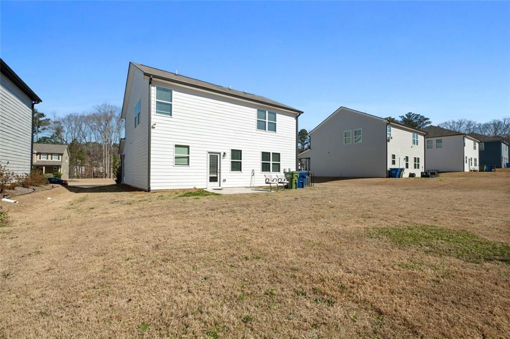 4006 Riverchess Drive Southwest Atlanta, GA 30331 - Photo 27 of 28 a large house with a outdoor space