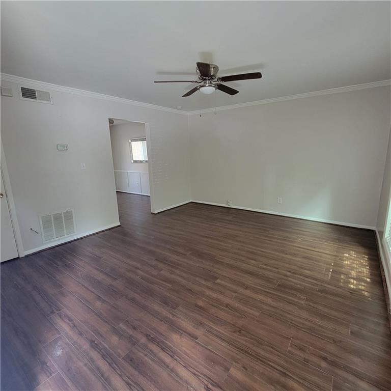 3545 Old Chamblee Tucker Road, Unit C Atlanta, GA 30340 - Photo 3 of 14 a view of an empty room with wooden floor