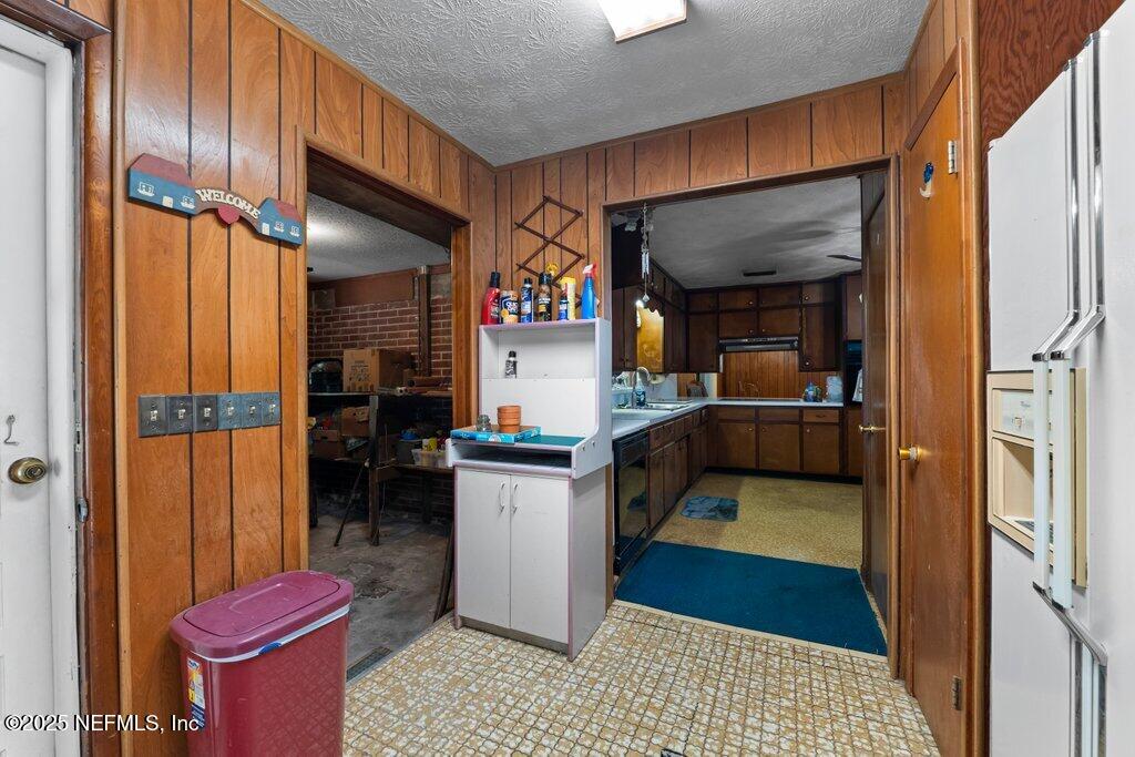 1308 Rigdon Road Jacksonville, FL 32220 - Photo 22 of 32 a kitchen view of a refrigerator and a sink