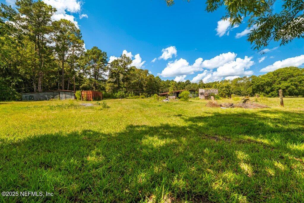 1308 Rigdon Road Jacksonville, FL 32220 - Photo 32 of 32 a view of an ocean yard and mountain view