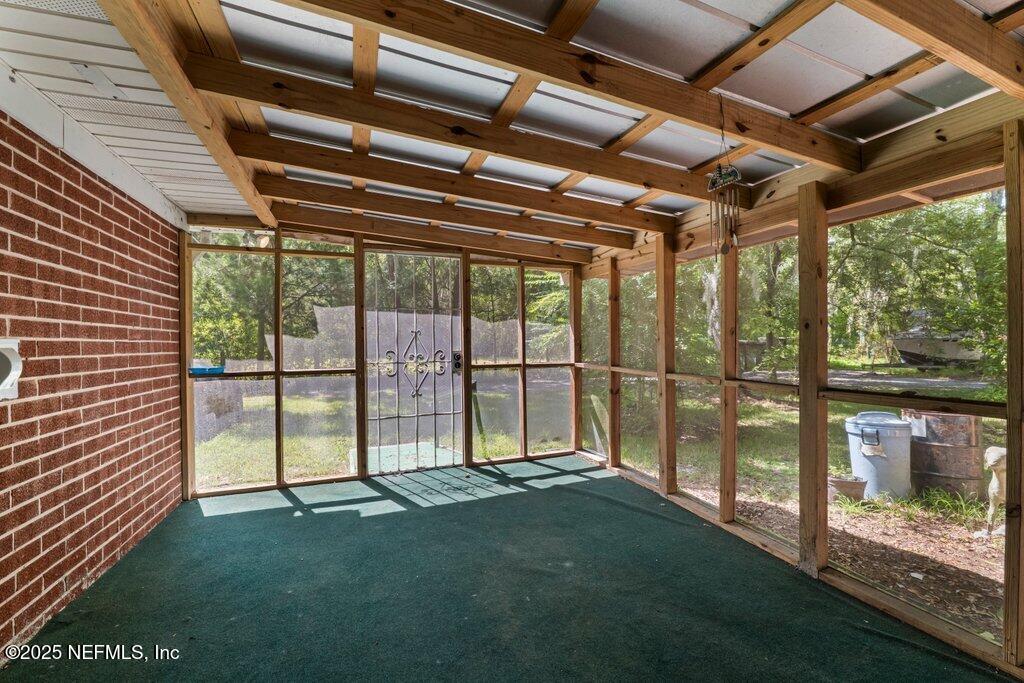 1308 Rigdon Road Jacksonville, FL 32220 - Photo 8 of 32 a view of an empty room with a fireplace