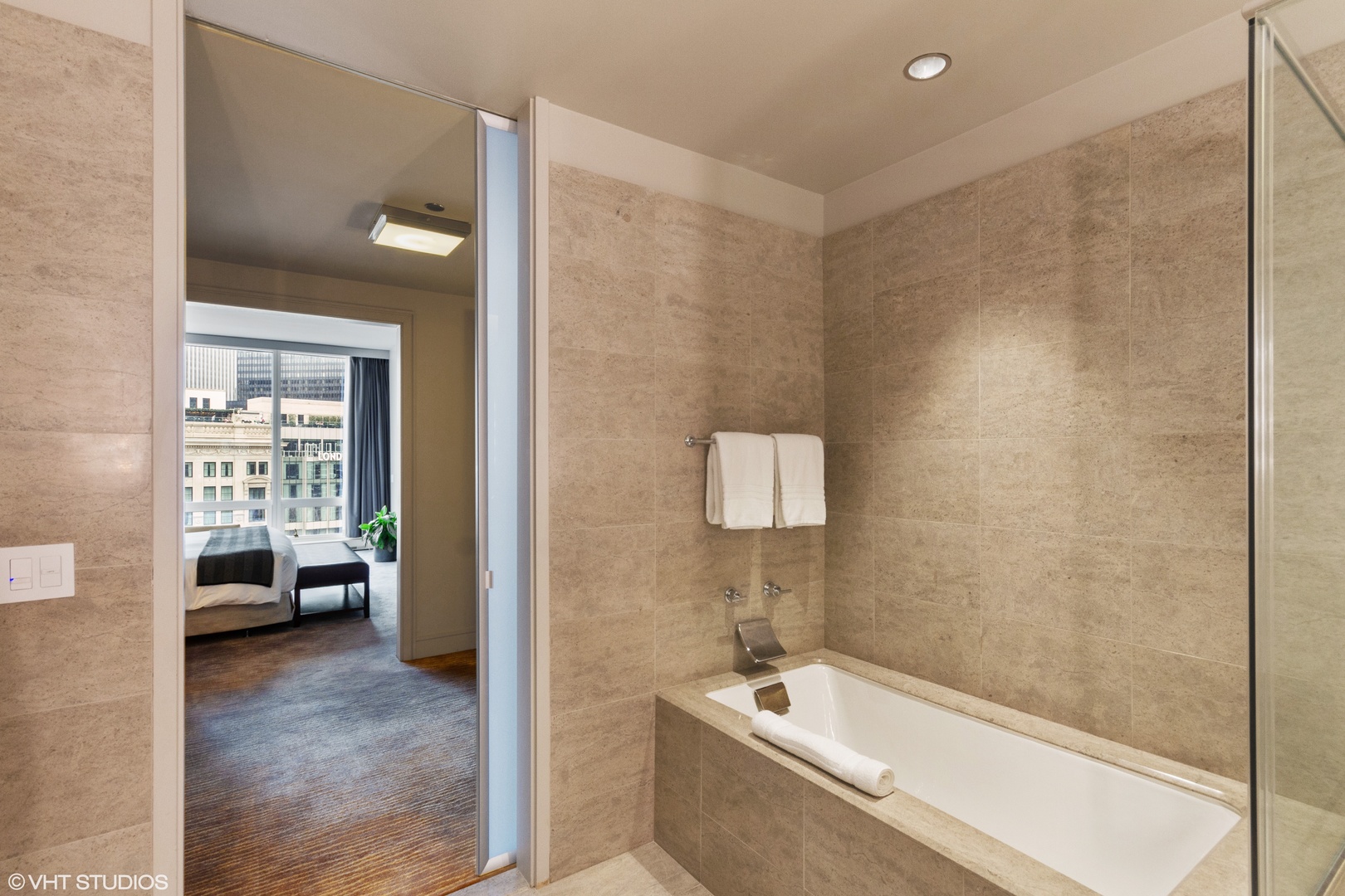 401 North Wabash Avenue, Unit 1842 Chicago, IL 60611 - Photo 14 of 21 a view of a bathroom with tub shower