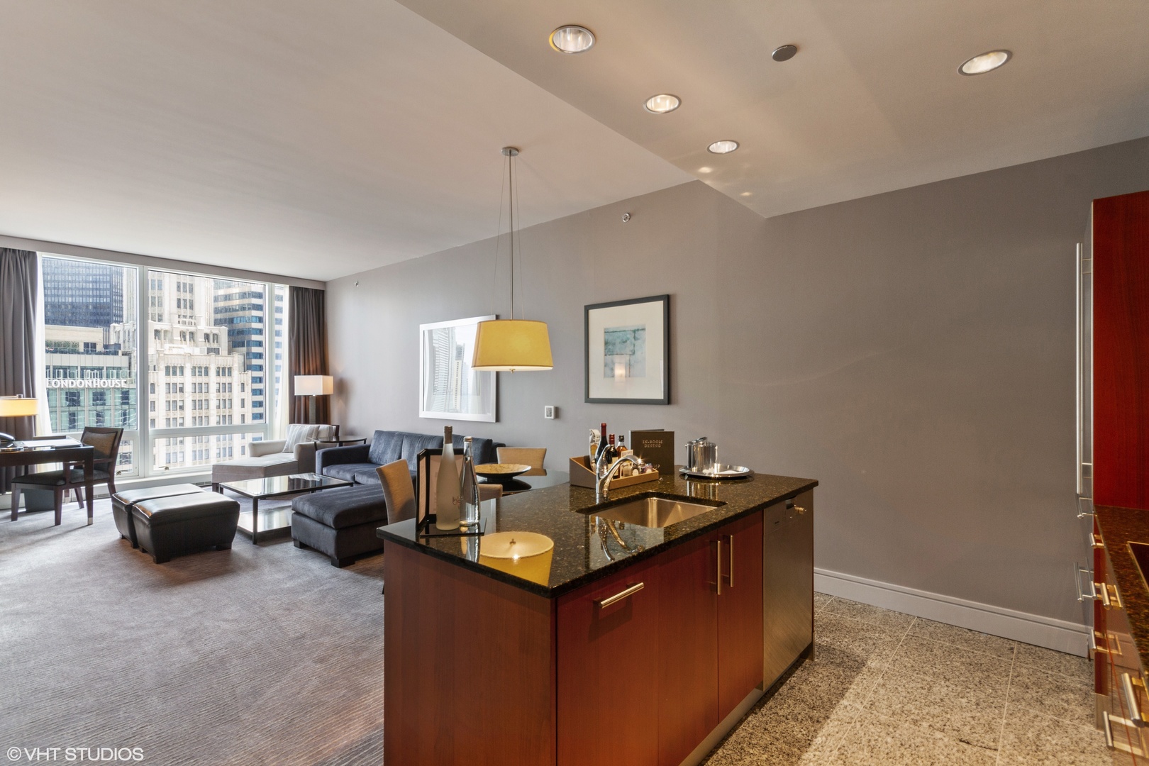 401 North Wabash Avenue, Unit 1842 Chicago, IL 60611 - Photo 3 of 21 a living room with furniture and a flat screen tv