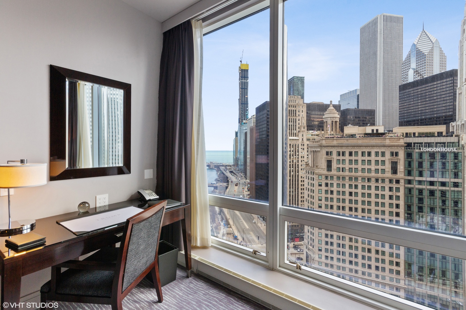 401 North Wabash Avenue, Unit 1842 Chicago, IL 60611 - Photo 6 of 21 a view of a balcony with wooden floor