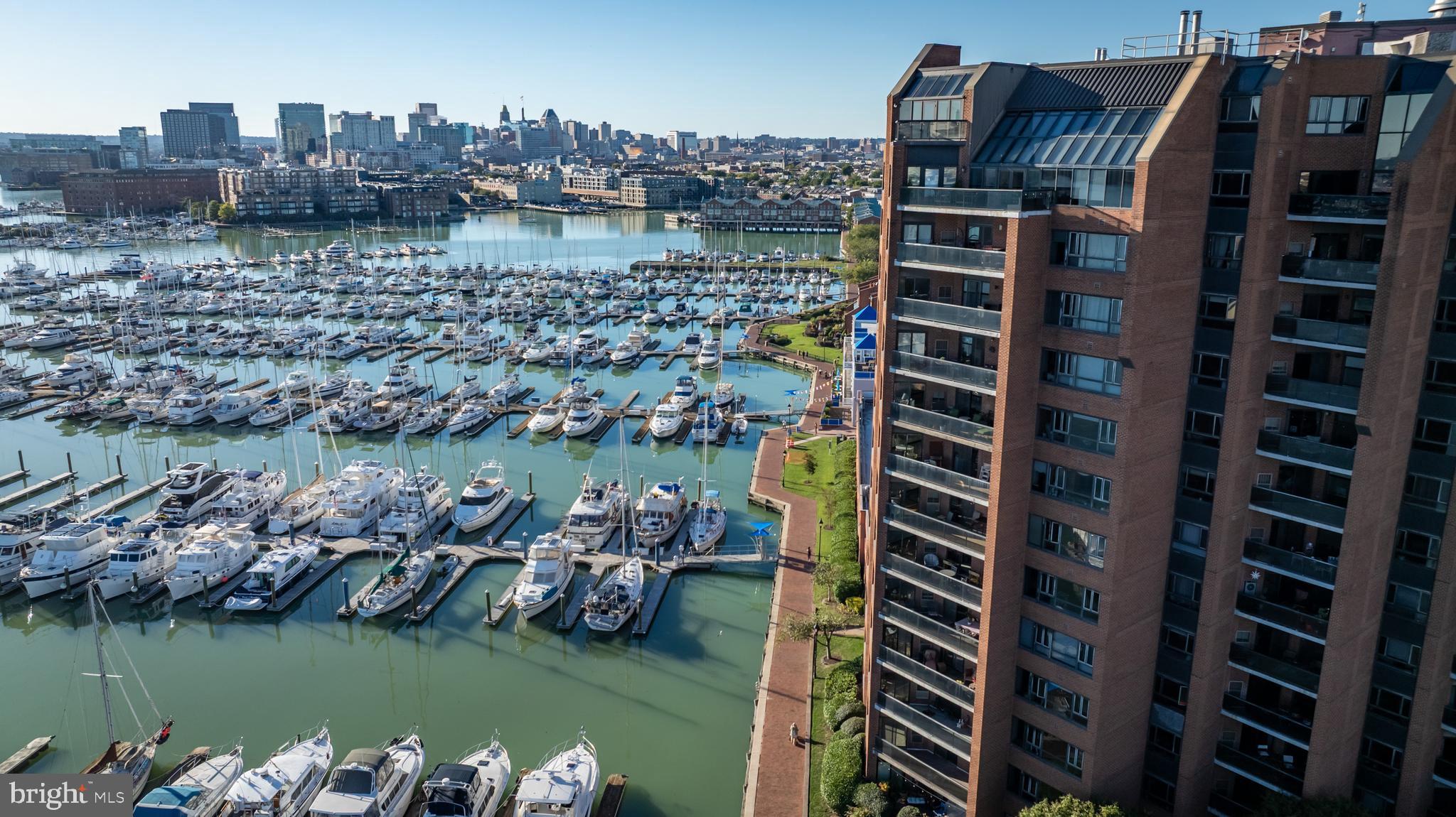 2515 Boston Street, Unit 1108 Baltimore, MD 21224 - Photo 26 of 40 a view of a lake and a city