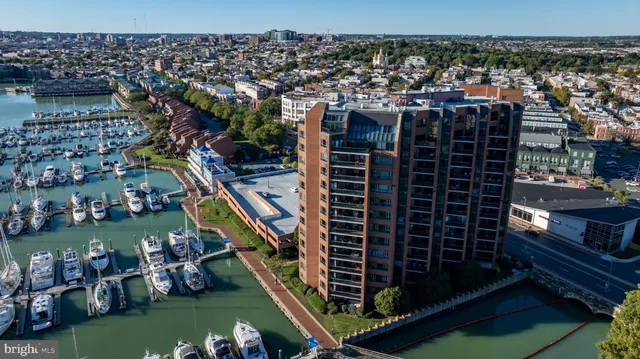a view of a living room with a floor to ceiling window and floor to ceiling window