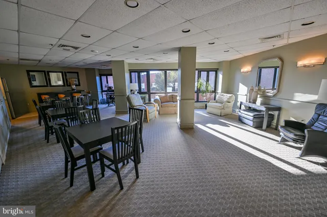 a view of a livingroom with furniture window and outside view