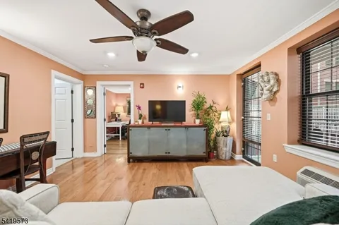 a kitchen with stainless steel appliances granite countertop a sink and a stove