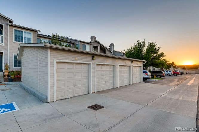 8312 Pebble Creek Way, Unit 104 Highlands Ranch, CO 80126 - Photo 12 of 12 a view of a car garage