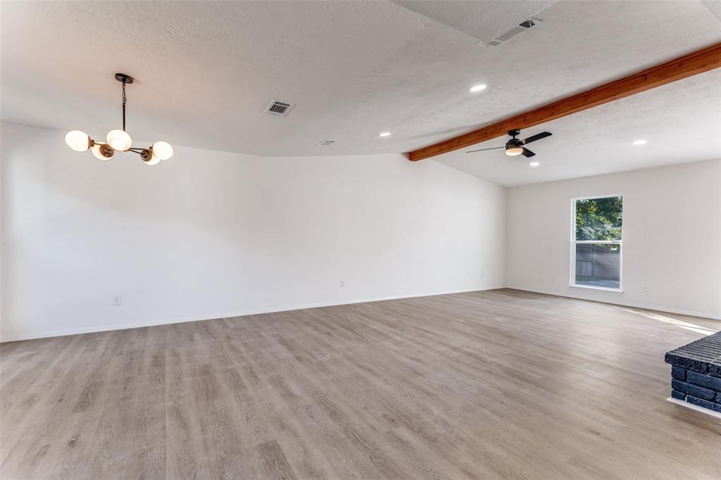 4108 Bristlecone Lane Fort Worth, TX 76137 - Photo 22 of 25 a view of an empty room with wooden floor