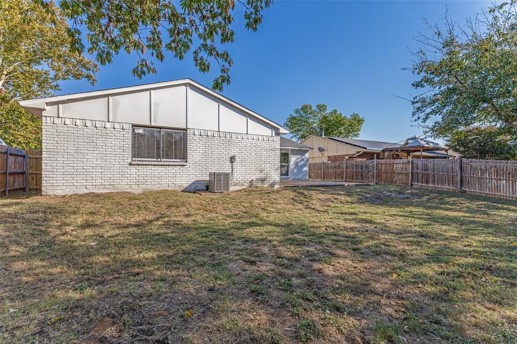4108 Bristlecone Lane Fort Worth, TX 76137 - Photo 3 of 25 a house view with a backyard space