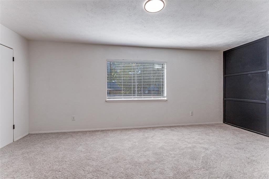 4108 Bristlecone Lane Fort Worth, TX 76137 - Photo 5 of 25 an empty room with windows
