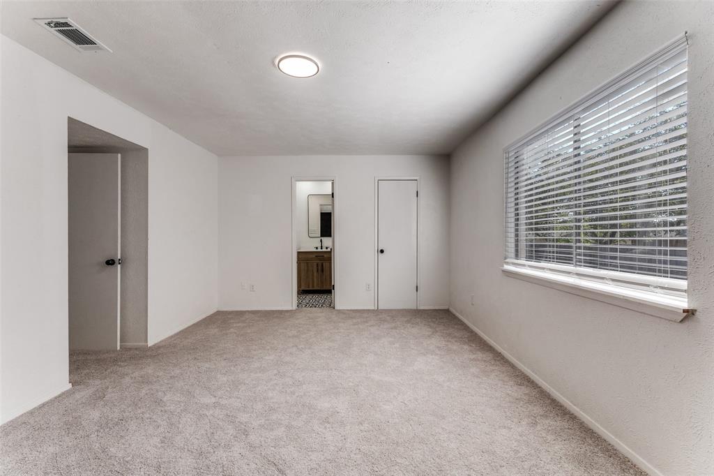 4108 Bristlecone Lane Fort Worth, TX 76137 - Photo 7 of 25 a view of an empty room with a window