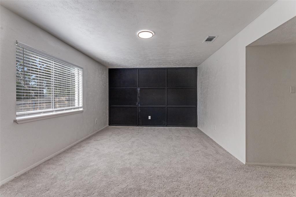 4108 Bristlecone Lane Fort Worth, TX 76137 - Photo 8 of 25 a view of an empty room with a window
