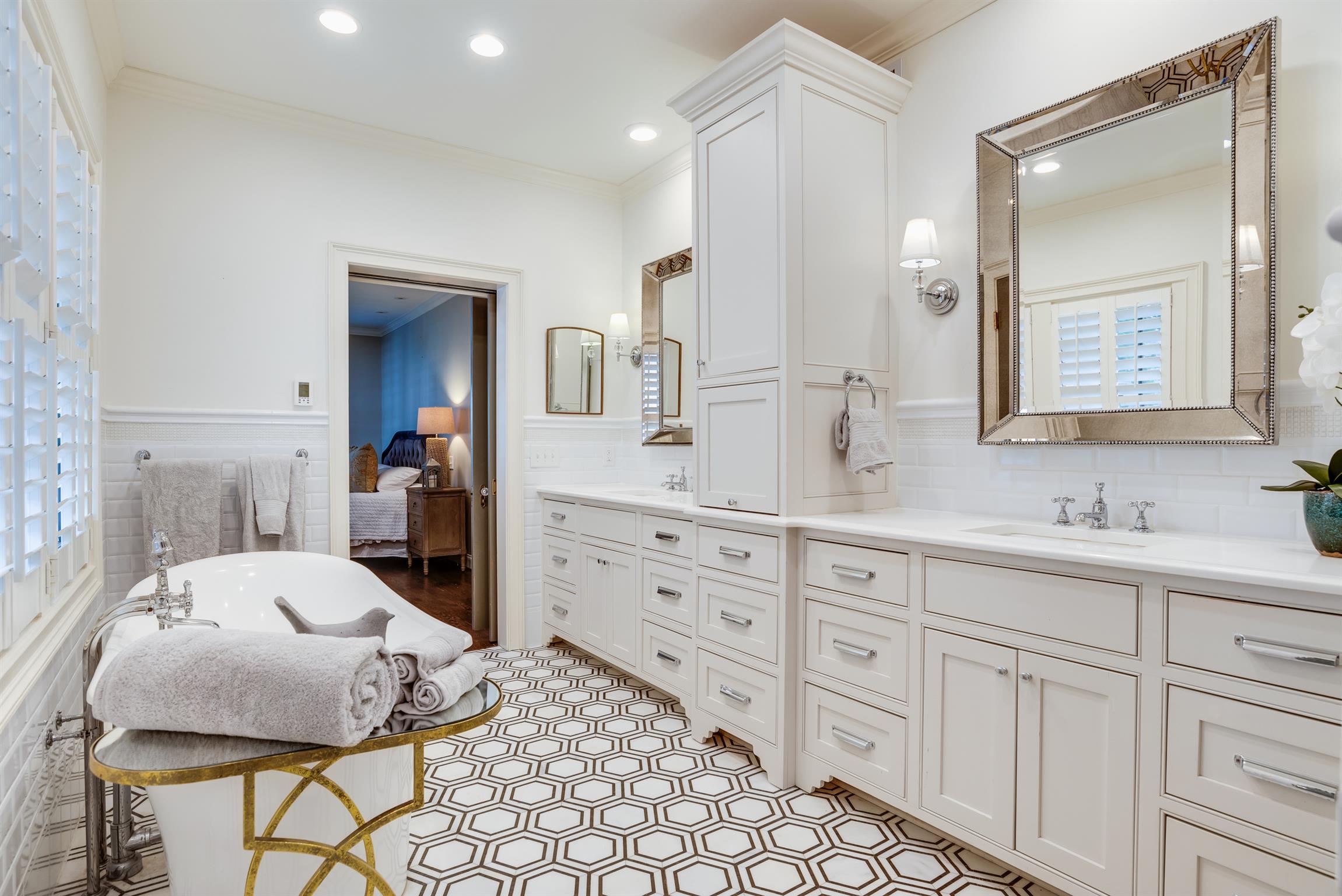 3904 Valley Road Nashville, TN 37205 - Photo 13 of 25 a spacious bedroom with a bed and cabinets