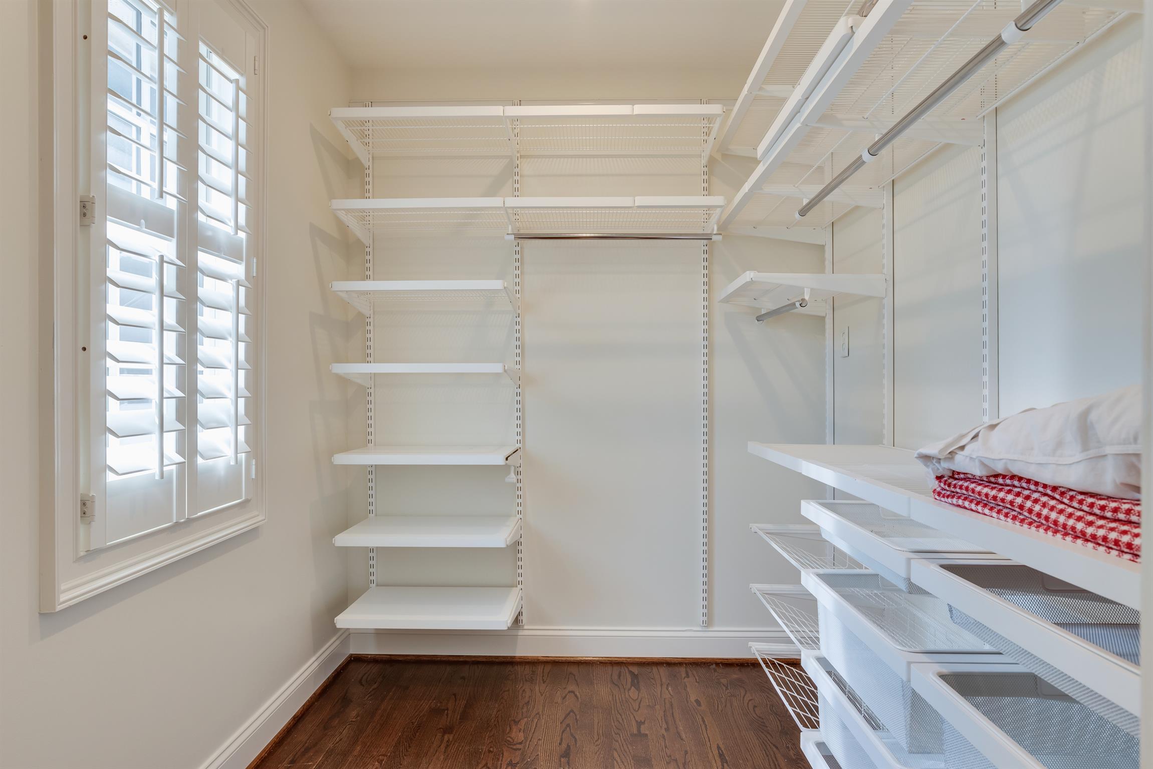 3904 Valley Road Nashville, TN 37205 - Photo 18 of 25 a view of walk in closet with empty racks